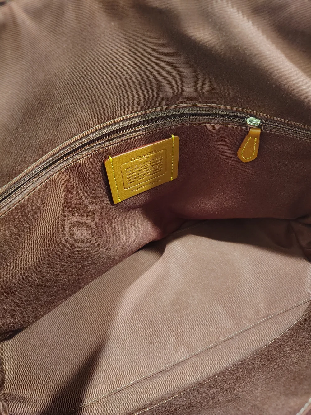 Coach Brown Signature Tote with Pink Bow Accents